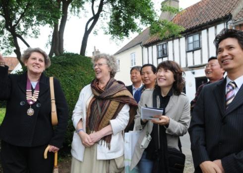 Visitors from Korea on their walk round Aylsham. On the left is Liz Jones - chairman of Aylsham Town Council and second left Susan Flack of Broadland District Council. Photo: Paul Hewitt Copy:Cromer reporters For:EDP news EDP pics © 2008 (01603) 772435